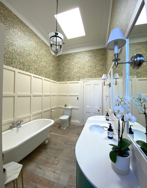 Wallpaper and paint in bathroom